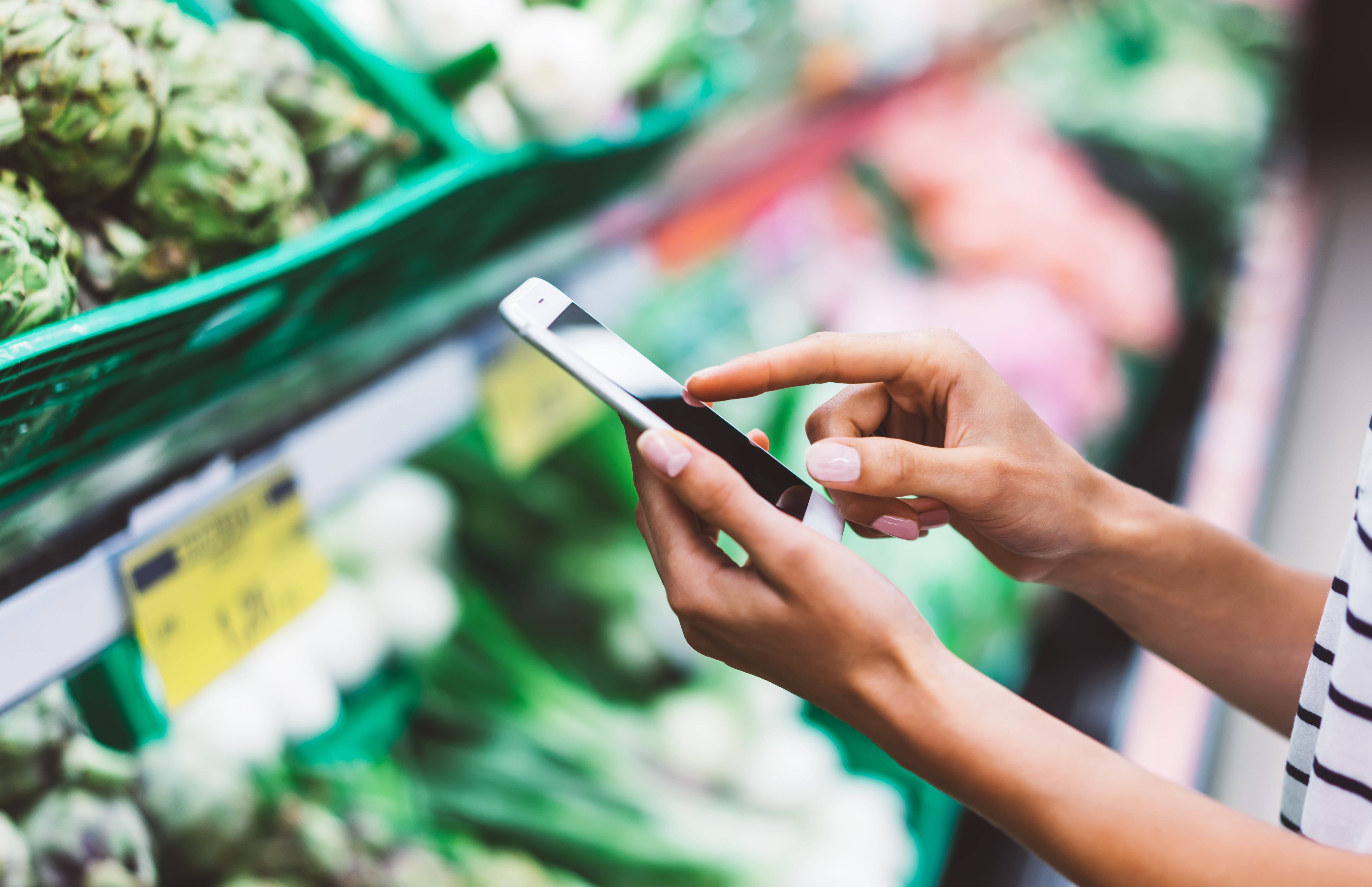 Shopper using a mobile phone